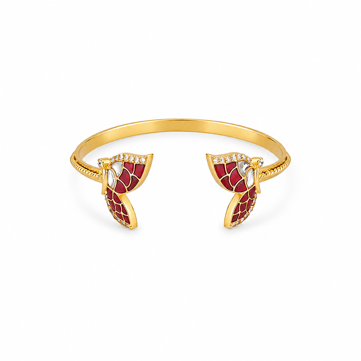 Gold open cuff bangle bracelet with red enamel leaf-shaped end pieces and small clear rhinestone accents, shown on a plain white background.